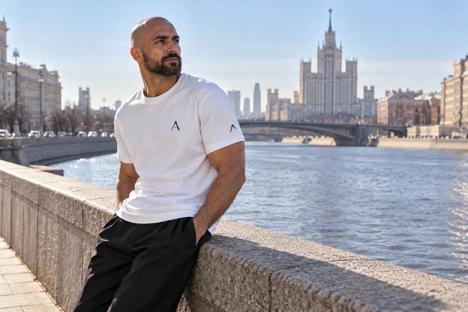 Generated ALTIOR editorial: adult man wearing ghost white core tee in a Moscow riverside-inspired setting.