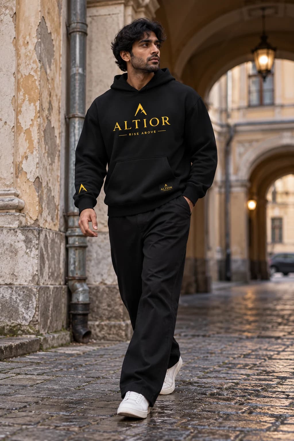 Generated ALTIOR editorial: adult man wearing obsidian gold summit hoodie in a Saint Petersburg courtyard-inspired setting.