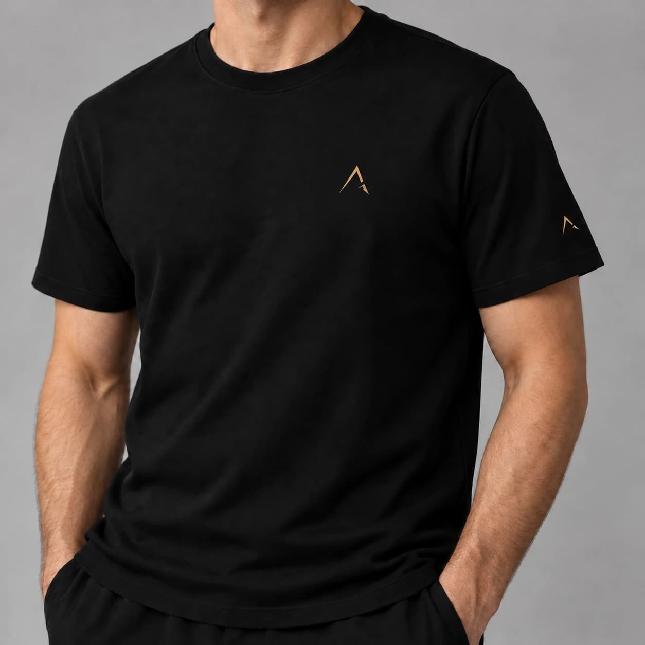 Core tee — Black with gold detailing, AI-generated garment detail study