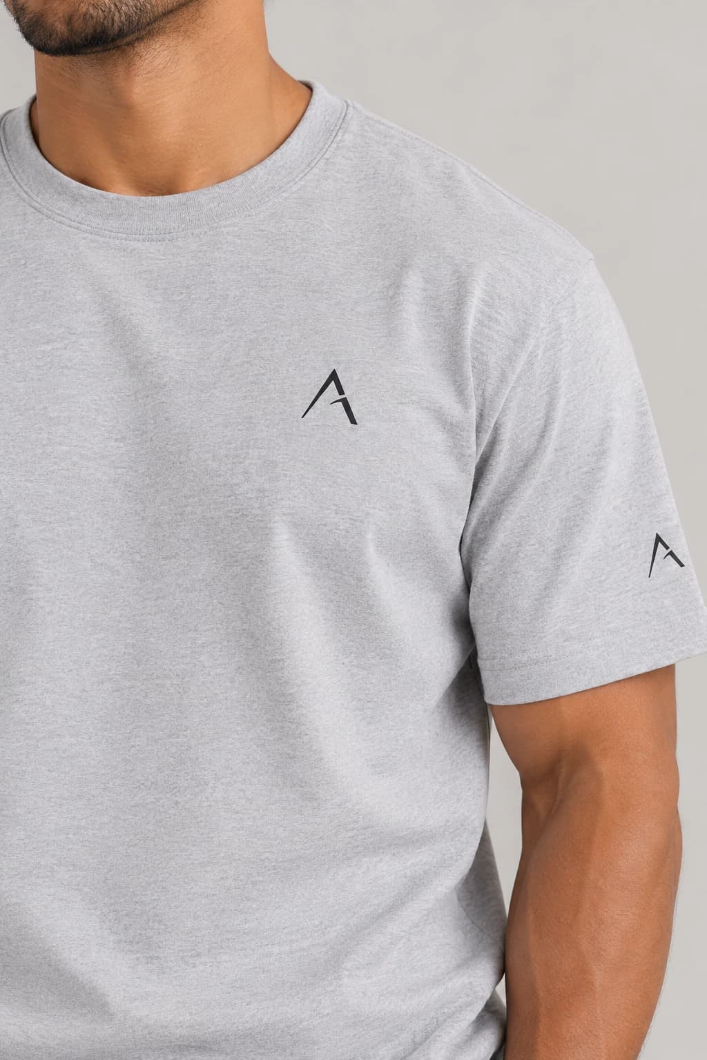 Core tee — Grey with black detailing, AI-generated garment detail study