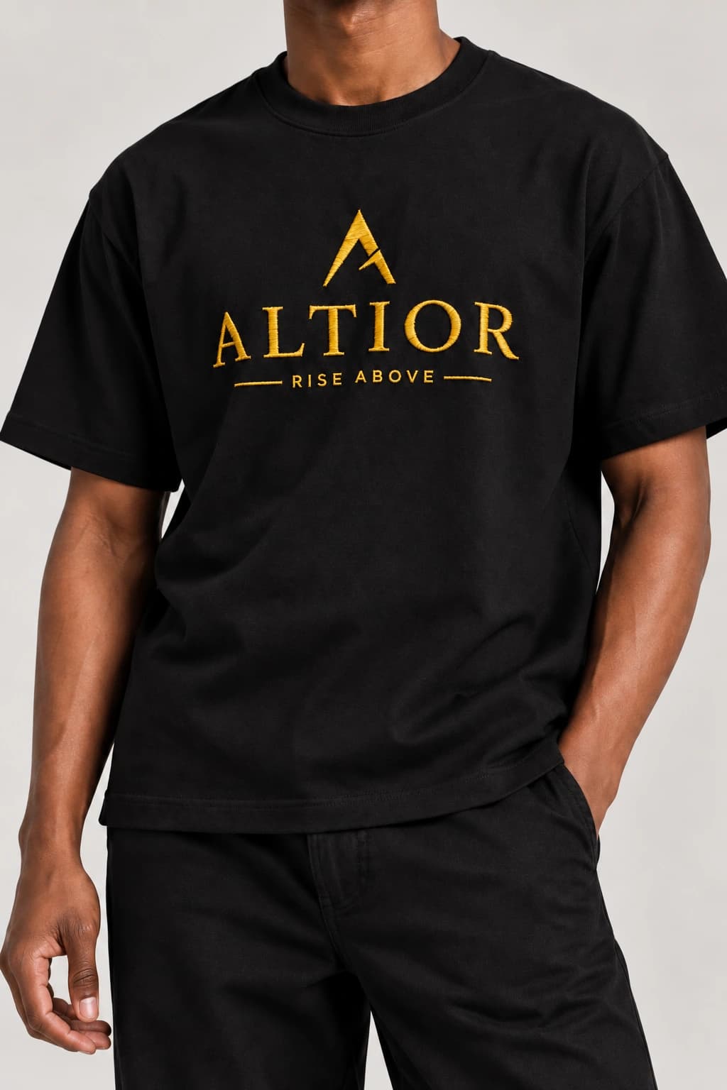 Signature tee — Black with gold detailing, AI-generated garment detail study