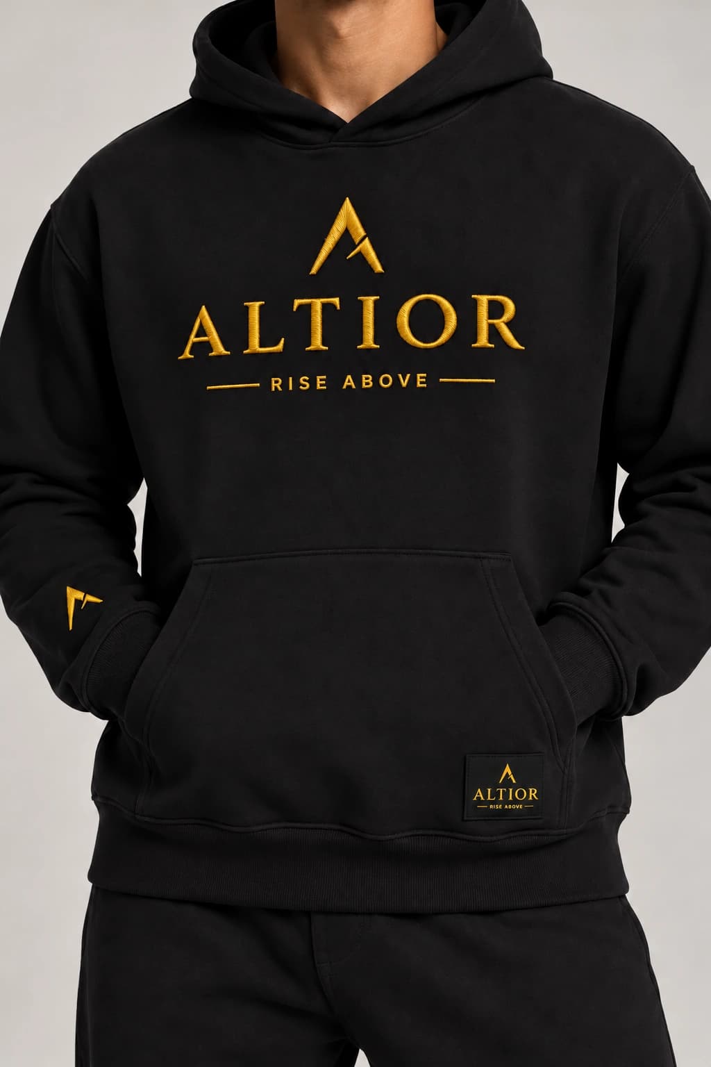500 GSM hoodie — Black with gold detailing, AI-generated garment detail study