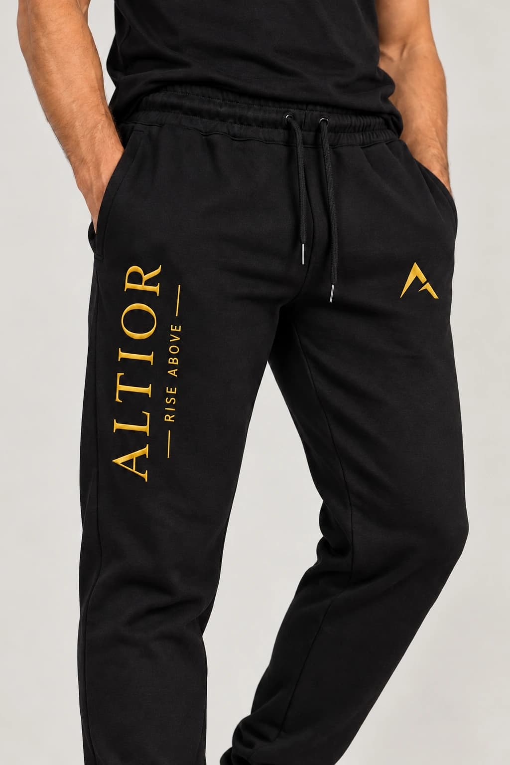 Track pants — Black with gold detailing, AI-generated track pants detail study
