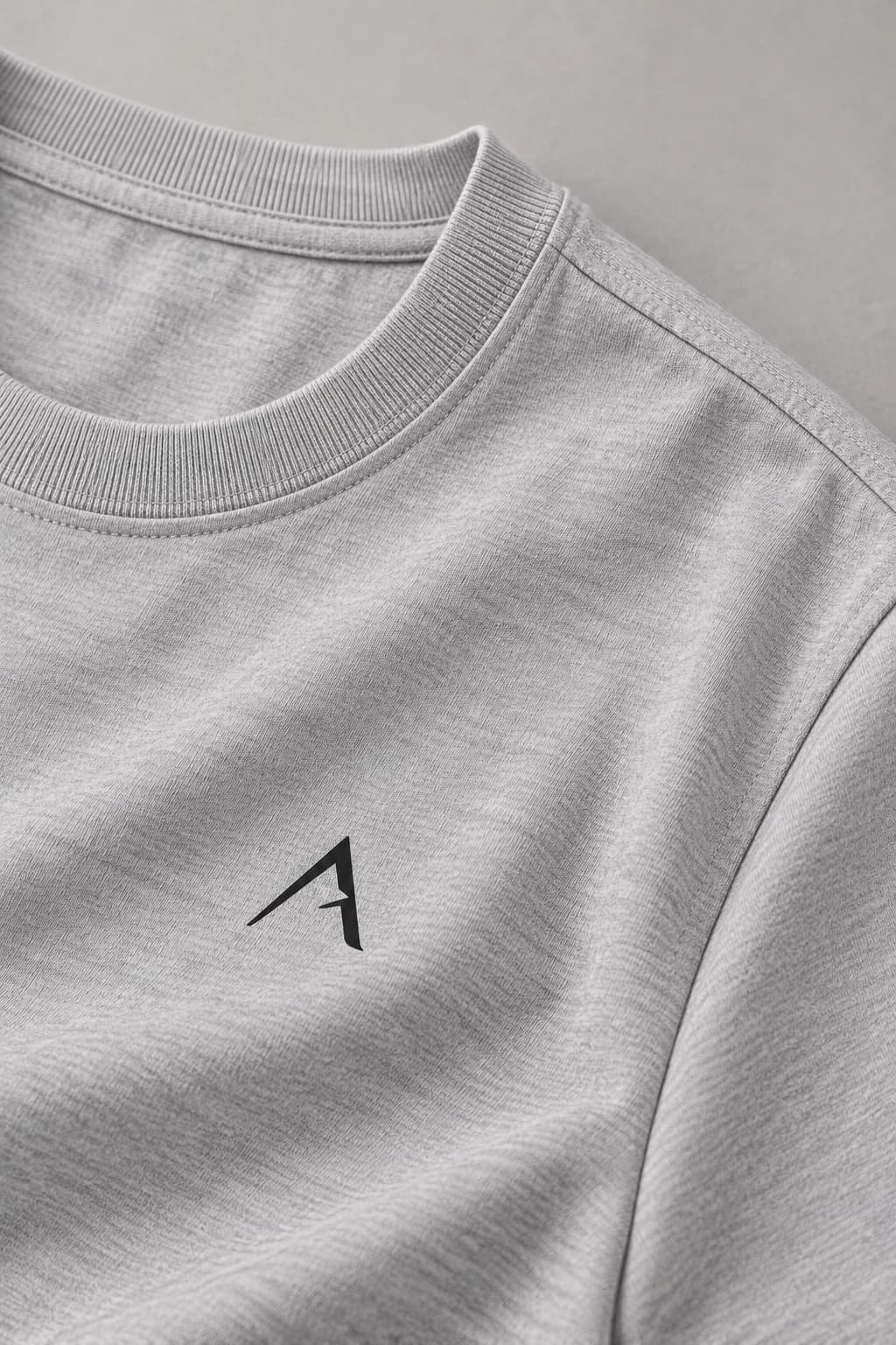 Core tee — Grey with black detailing, AI-generated flat transfer and fabric close-up study