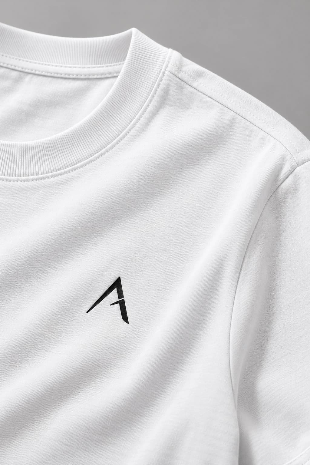 Core tee — White with black detailing, AI-generated flat transfer and fabric close-up study