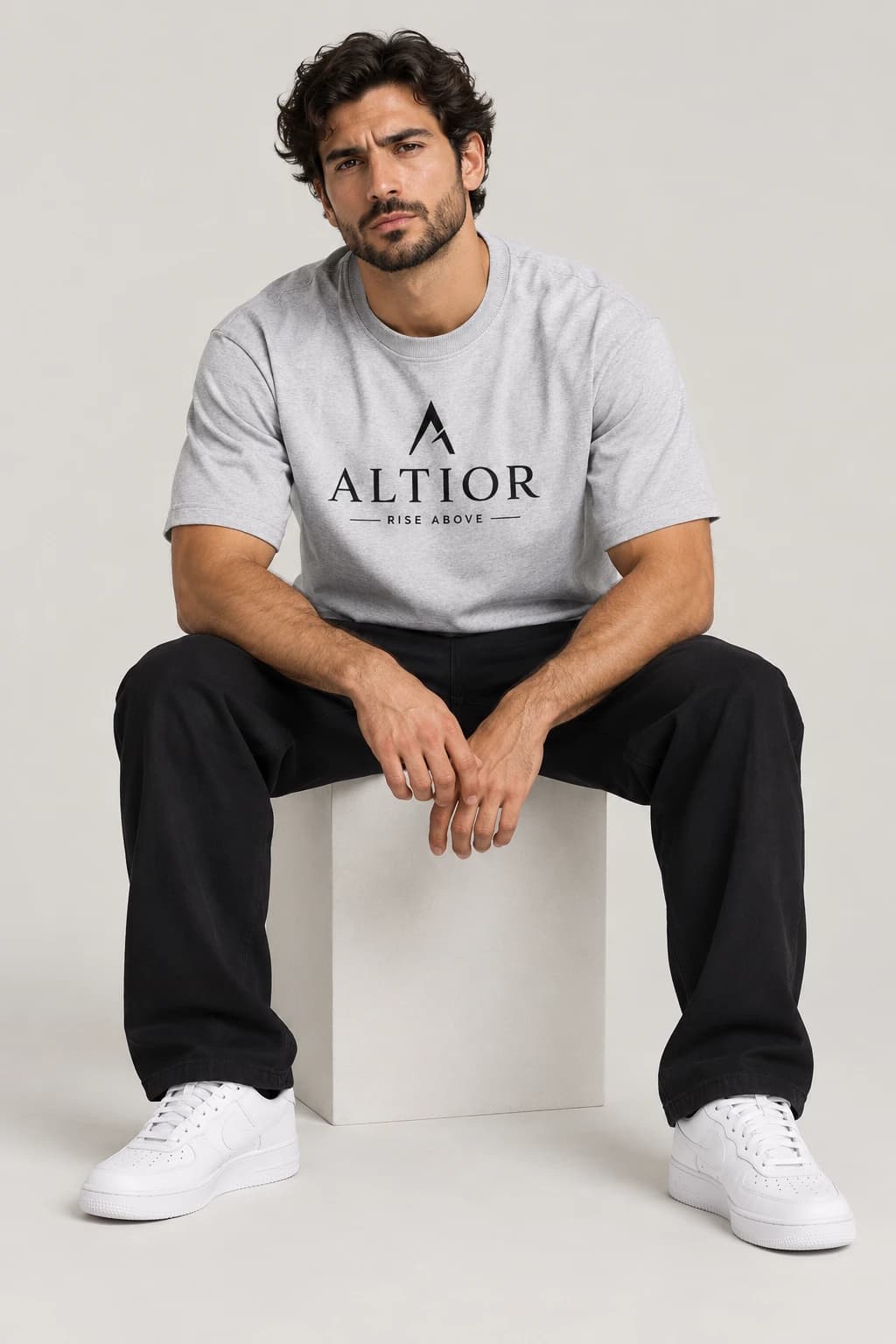 Signature tee — Grey with black detailing, front view on male model