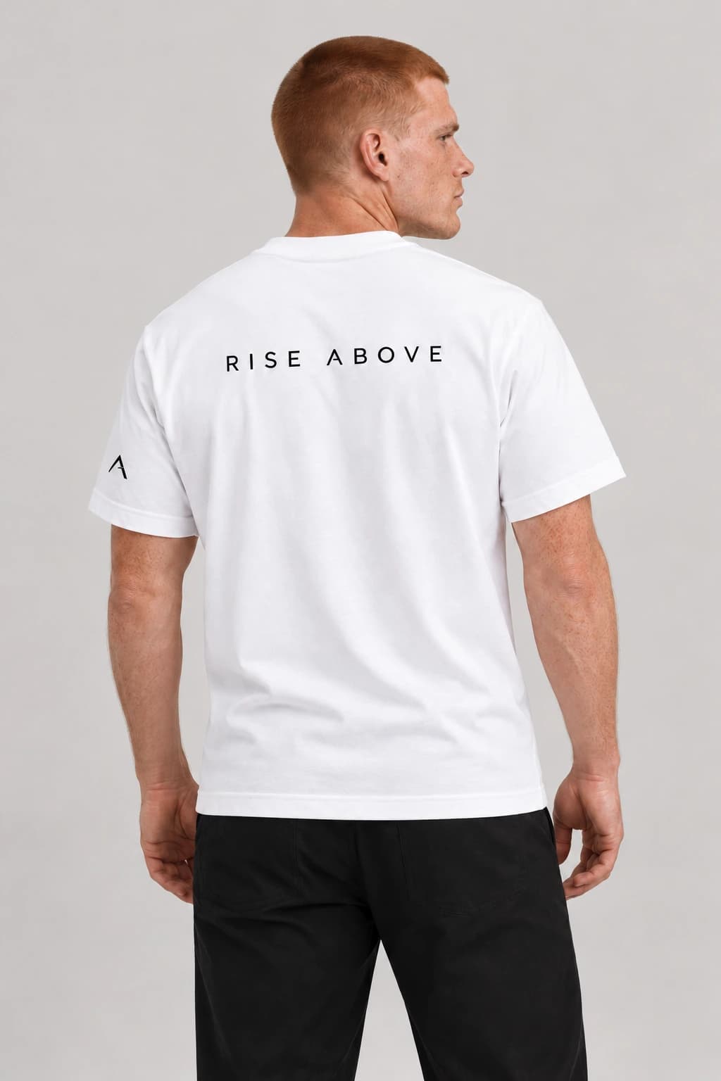 Core tee — White with black detailing, back view on model