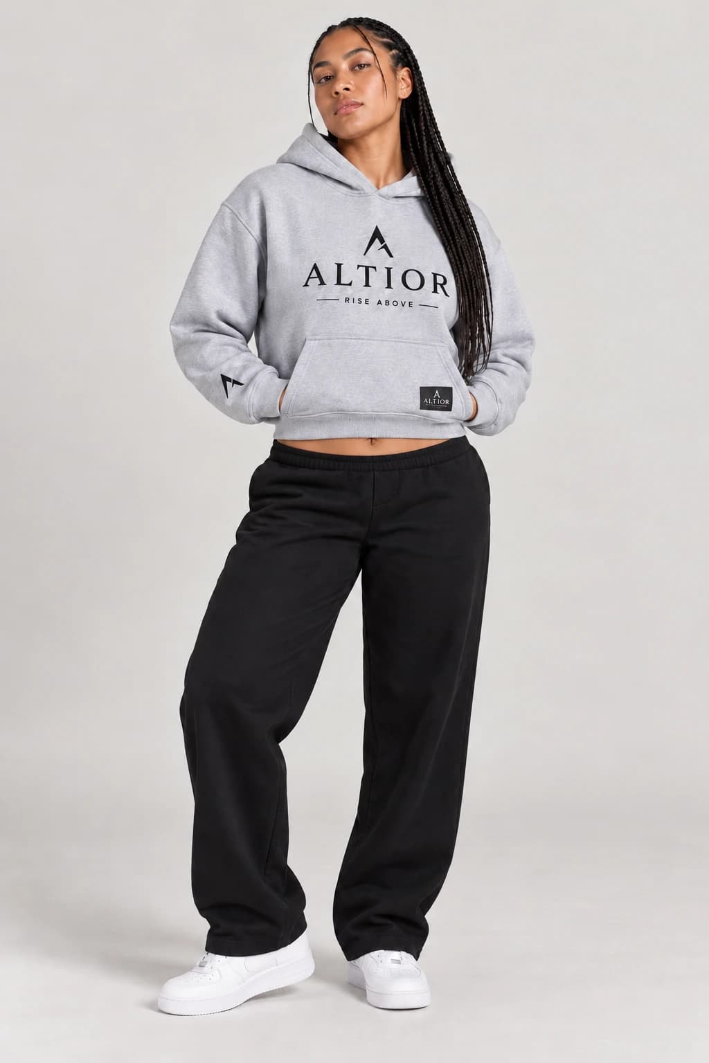 Cropped hoodie — Grey with black detailing, front view on female model