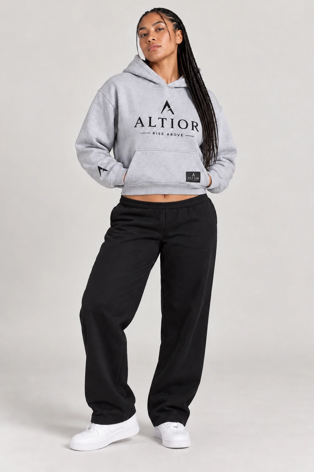 Cropped hoodie — Grey with black detailing, front view on female model