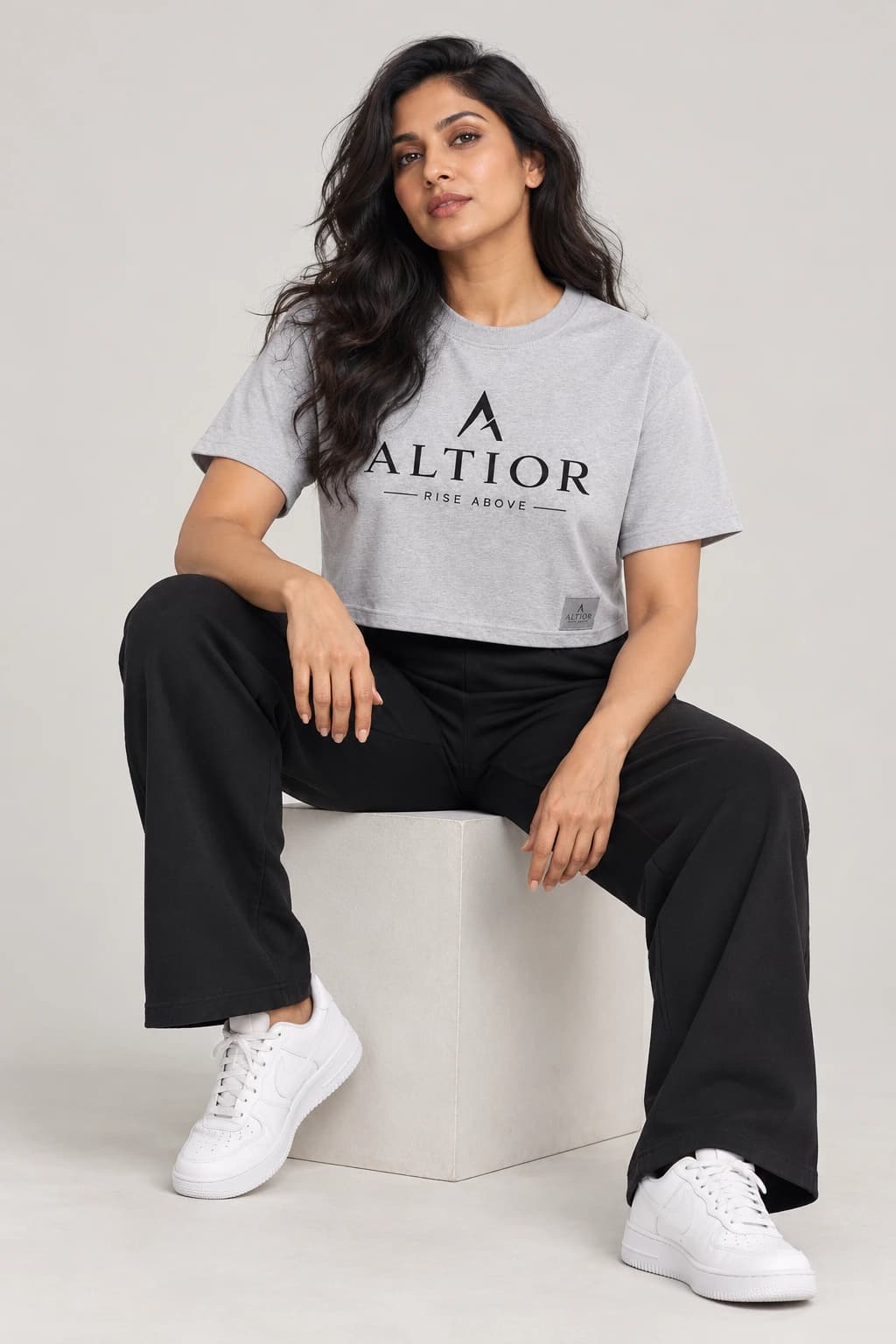 Cropped tee — Grey with black detailing, front view on female model