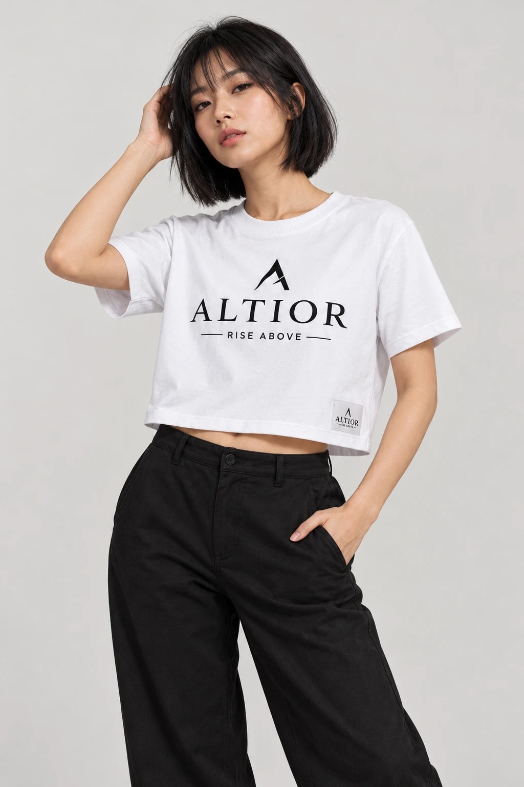Cropped tee — White with black detailing, front view on female model