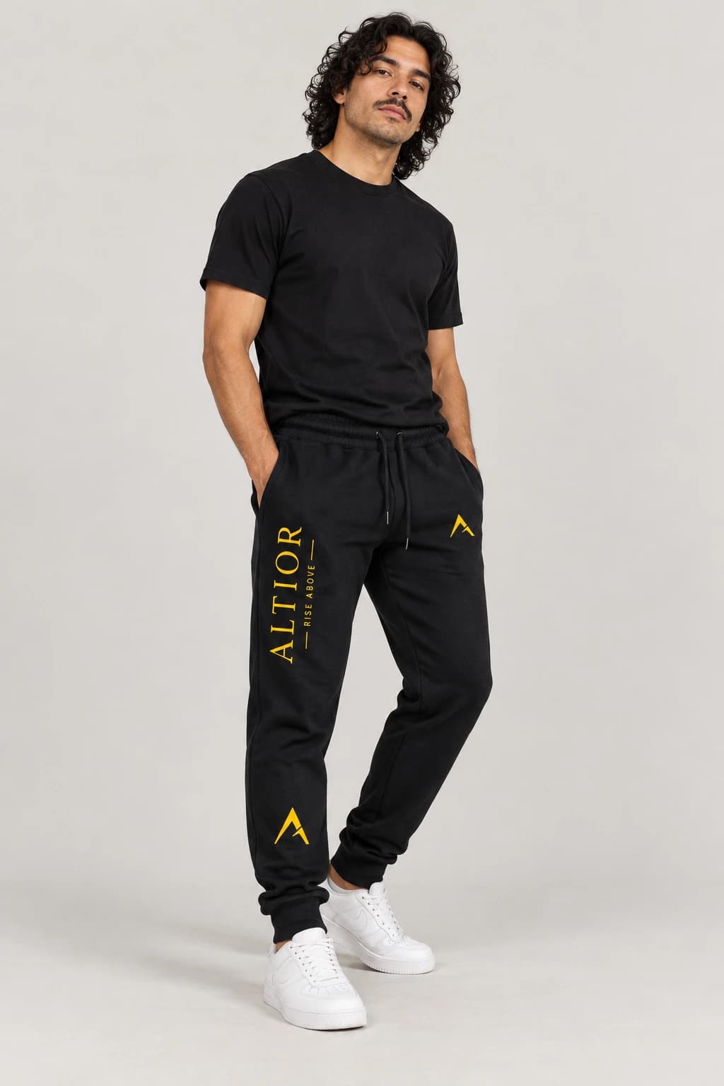 Track pants — Black with gold detailing, track pants on male model