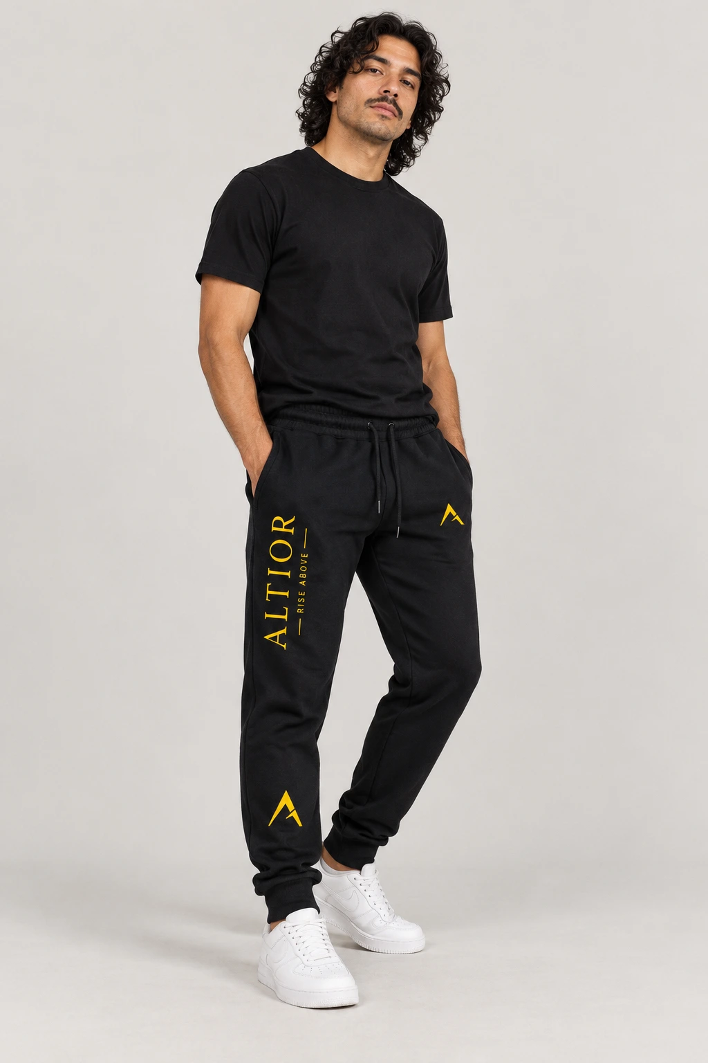 Track pants — Black with gold detailing, track pants on male model