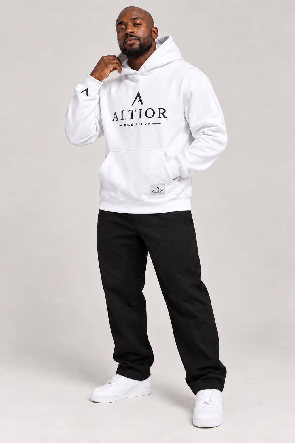 500 GSM hoodie — White with black detailing, front view on male model