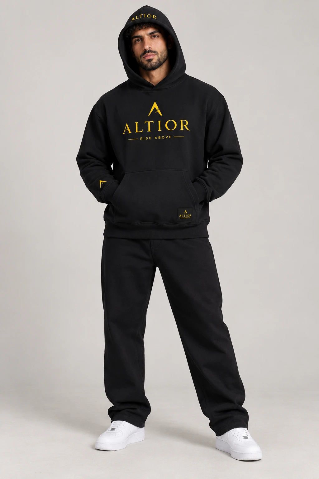 500 GSM hoodie — Black with gold detailing, front view on male model