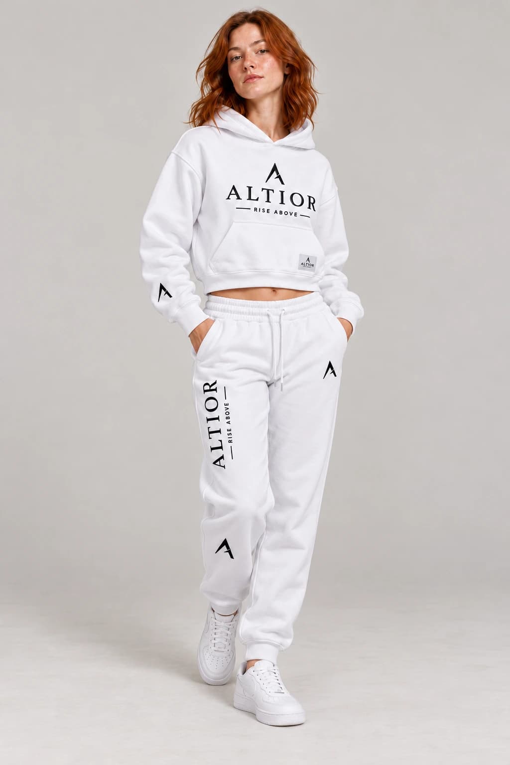 Women's tracksuit set — White with black detailing, complete outfit on female model
